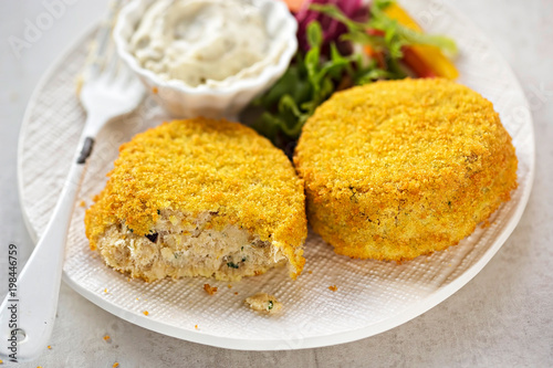 Принти на полотні Smoked whitefish fishcakes with tartare sauce and side salad