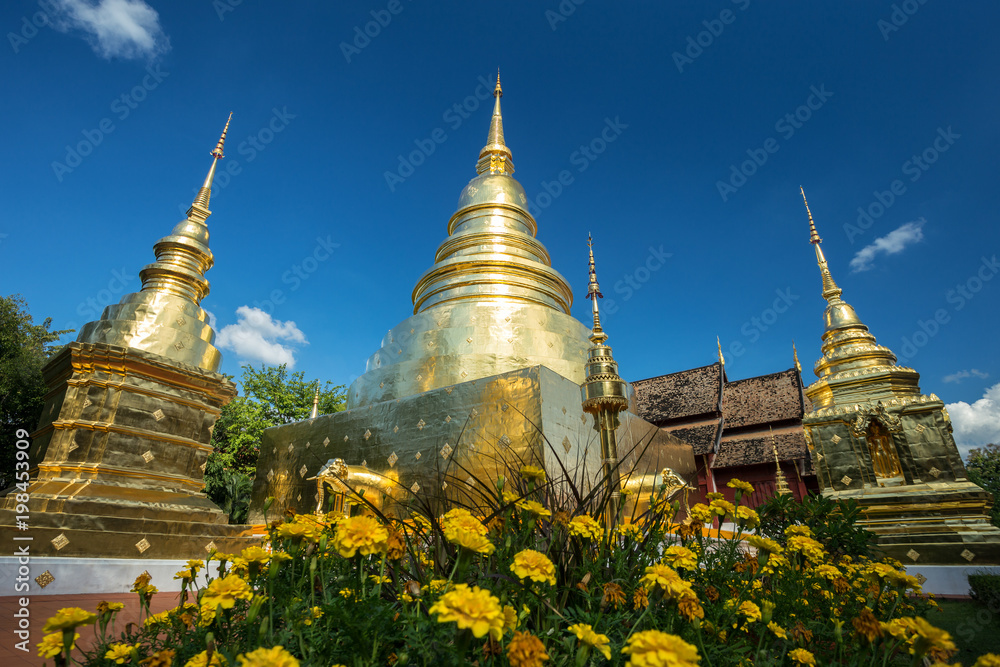 Naklejka premium Wat Phra Singh is a Buddhist temple (Thai language: Wat) in Chiang Mai, Northern Thailand.