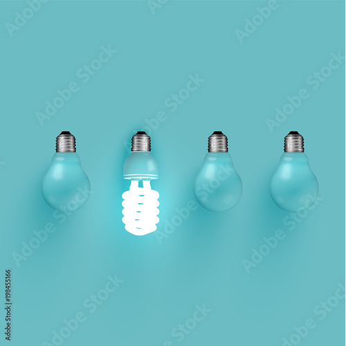 Energy saver lightbulb among old ones, vector illustration