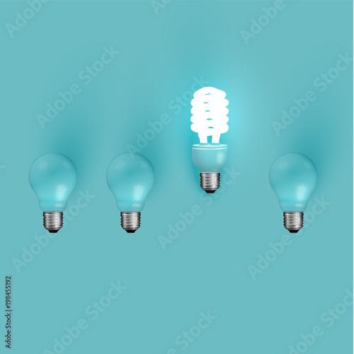 Energy saver lightbulb among old ones, vector illustration