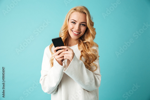 Portrait of a happy young blonde woman