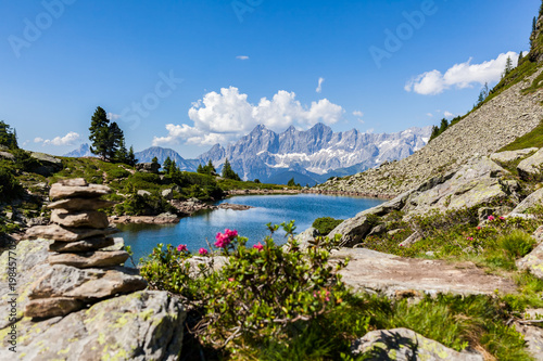 Lake Spiegelsee Mittersee and mountain range Dachstein in Styria, Austria photo