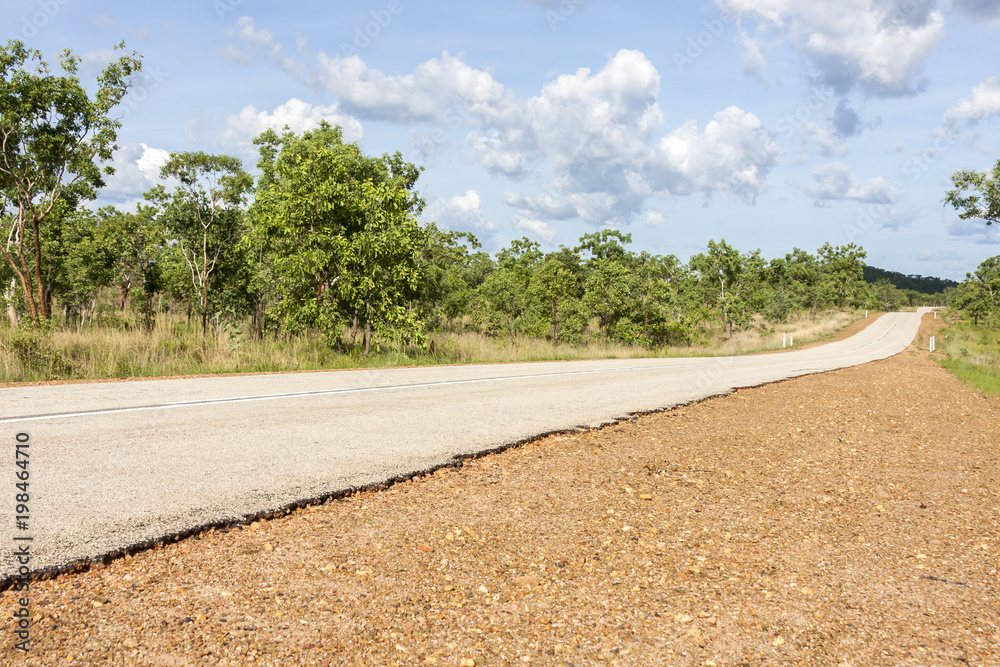 Empty asphalt road through Australian outback. Central Australia