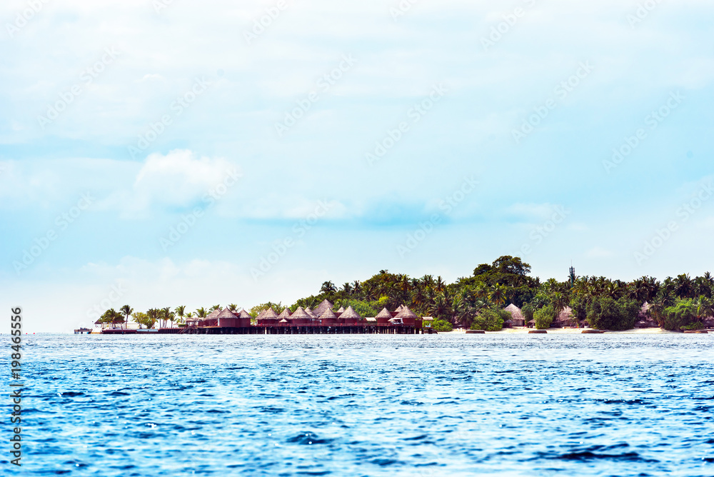 View of the tropical island of the Caribbean sea, Maldives. Copy space for text