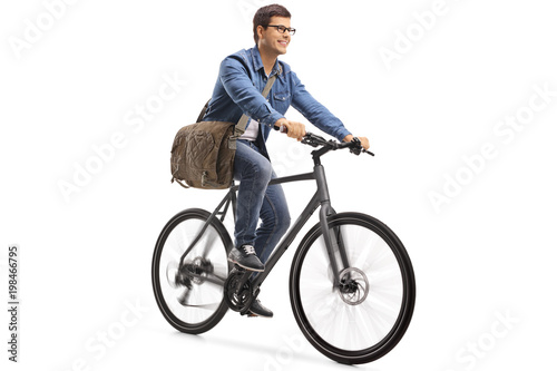 Young guy riding a bicycle
