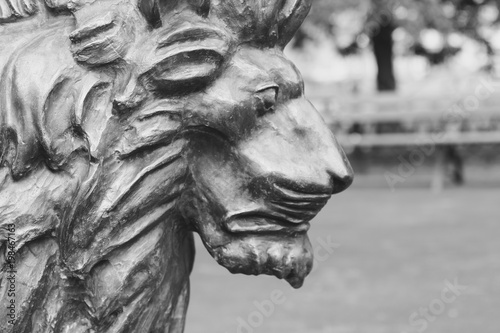 Lion statue in city Park photo