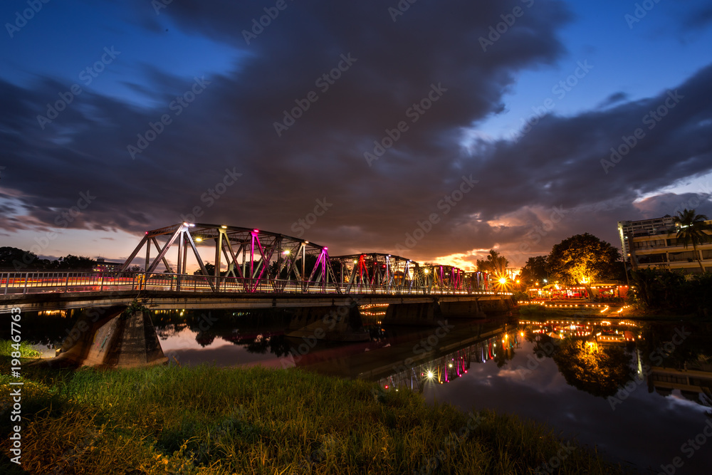 The color of the lights on the Iron Bridge in Chiang Mai, Thailand. The color of the lights on the Iron Bridge in Chiang Mai, Thailand.