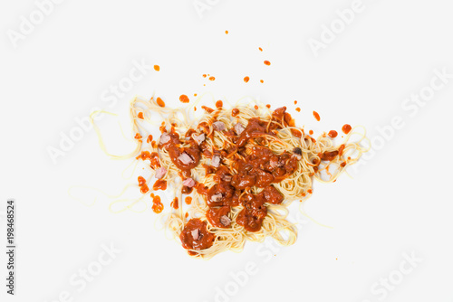 A fallen dish of pasta on the floor photo