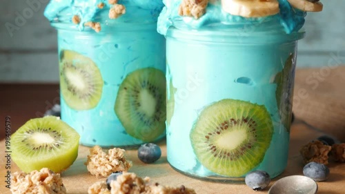 blue majik, summer spirulina smoothie on wooden desk, concept photo