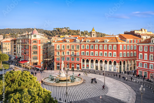 Aerial view of Place Massena square with red buildings and fountain in Nice, France photo