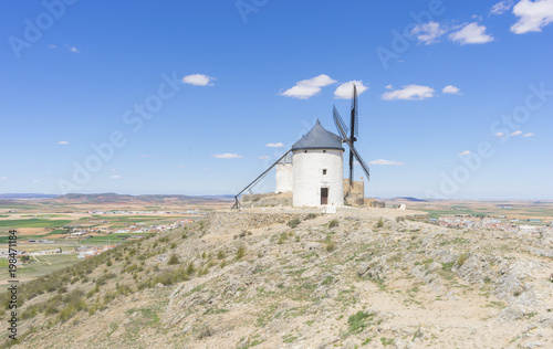 Travel, Beautiful summer above the windmills on the field in Spain