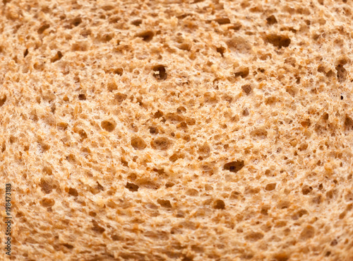 close up texture of brown rye bread macro detail food