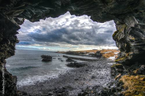 The perfect evening setting providing proof how dramatic Iceland's setting can be, seen through a cave