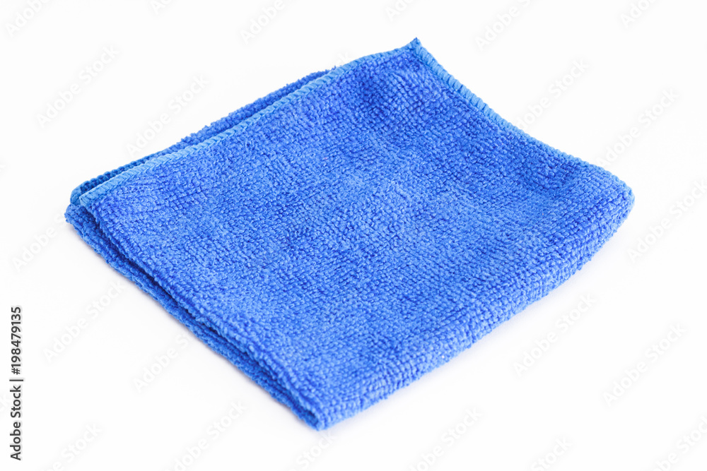 Blue folded microfiber cloth on white background Blue folded microfiber cloth on white background