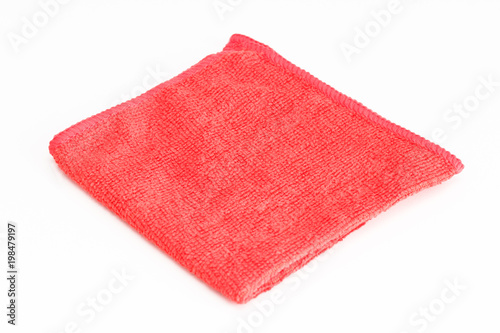 Red folded microfiber cloth on white background