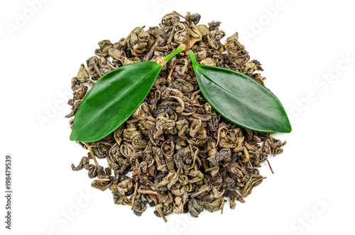 heap of green tea with leaves on white