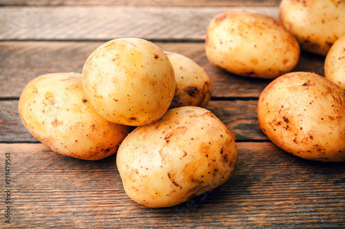 heap of raw potato roots