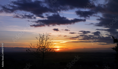 panoramic view of sunset with dramatic sky at the mountains  Evening skyline with orange light in  spring time at countryside in England  Beautiful Sunrise at mountains landscape