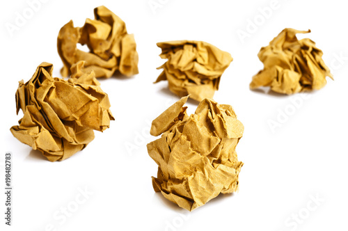 yellow crumpled paper balls on white