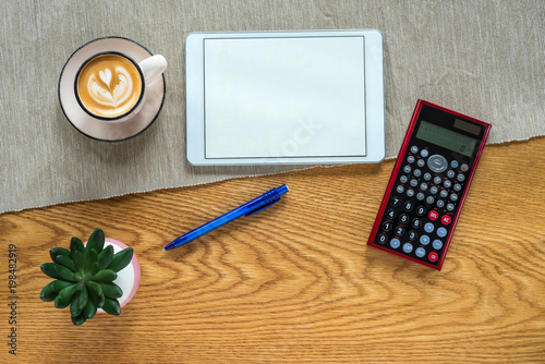 Template of financial accounting desk with calculator and tablet from above