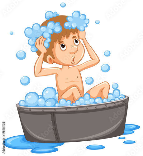 Boy taking bath in the tub