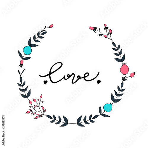 Floral wreath with love lettering. photo