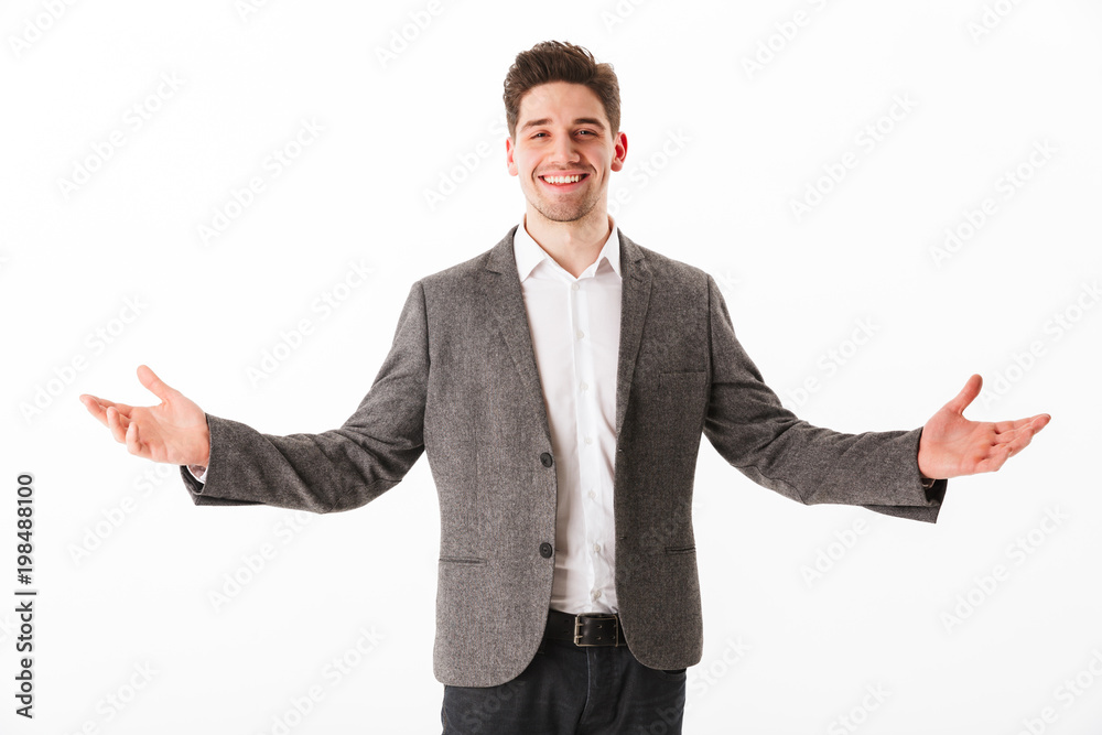 Happy pleased business man in jacket posing Happy pleased business man in jacket posing