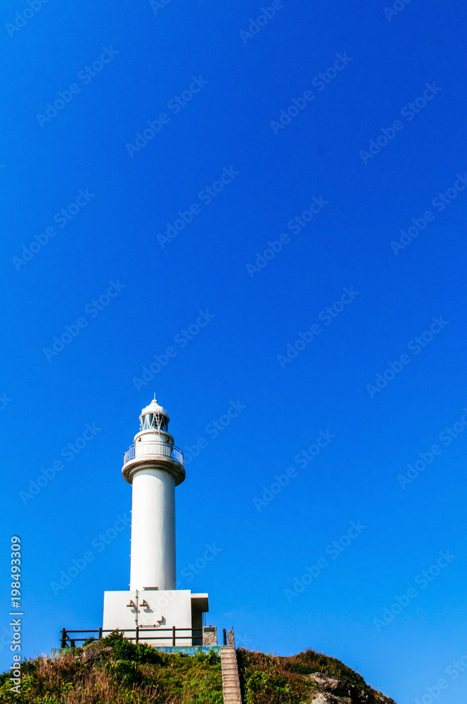 Lighthouse on Oganzaki cape. Attraction of Ishigaki island, Okinawa