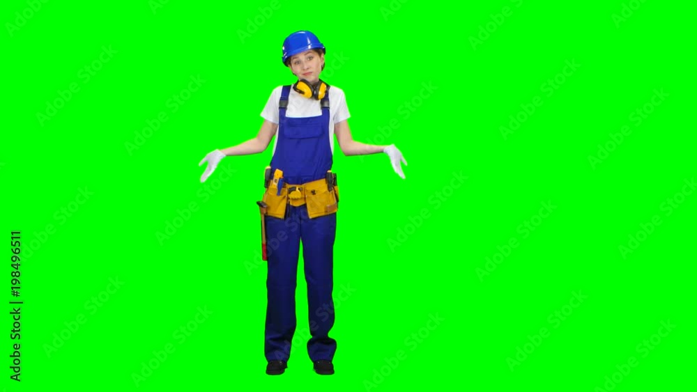Builder girl looks around, looking for her buddies. Green screen Builder girl looks around, looking for her buddies. Green screen