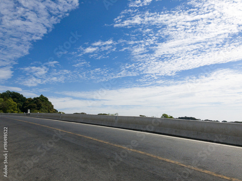 The curve of the road in the mountains with blue sky at Doi Inthanon Chiangmai.