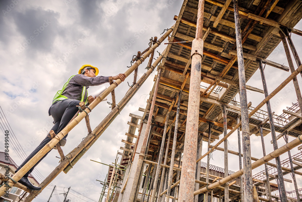 professional engineer worker at the house building construction site