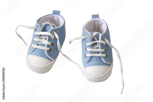 Blue first baby shoes isolated on white background