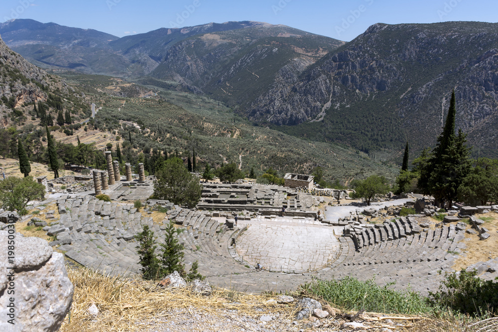 ruins of the Greek amphitheater in Delphi, Greece, mountain