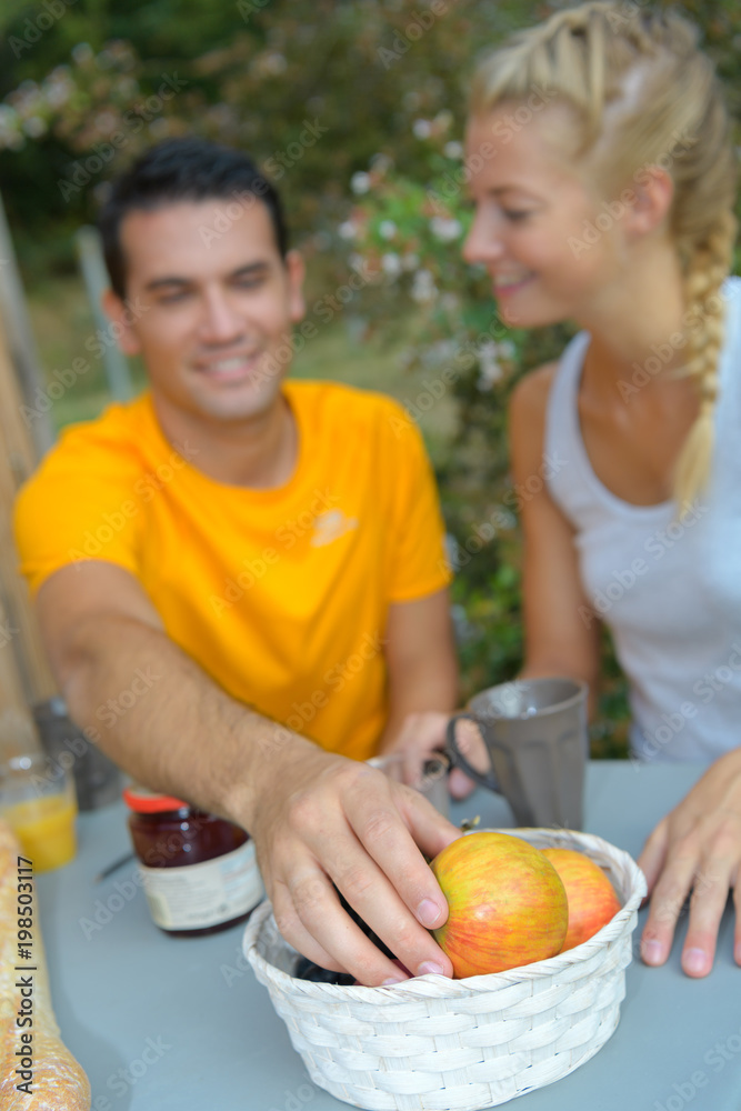 couple having breakfast outdoor couple having breakfast outdoor