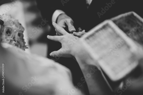 Wedding couple bide and groom get married in a church © olegparylyak