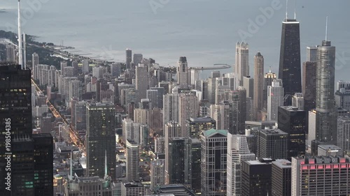 Chicago morning telephoto aerial view of Willis Tower with Chicago loop and Lake Michigan in the background