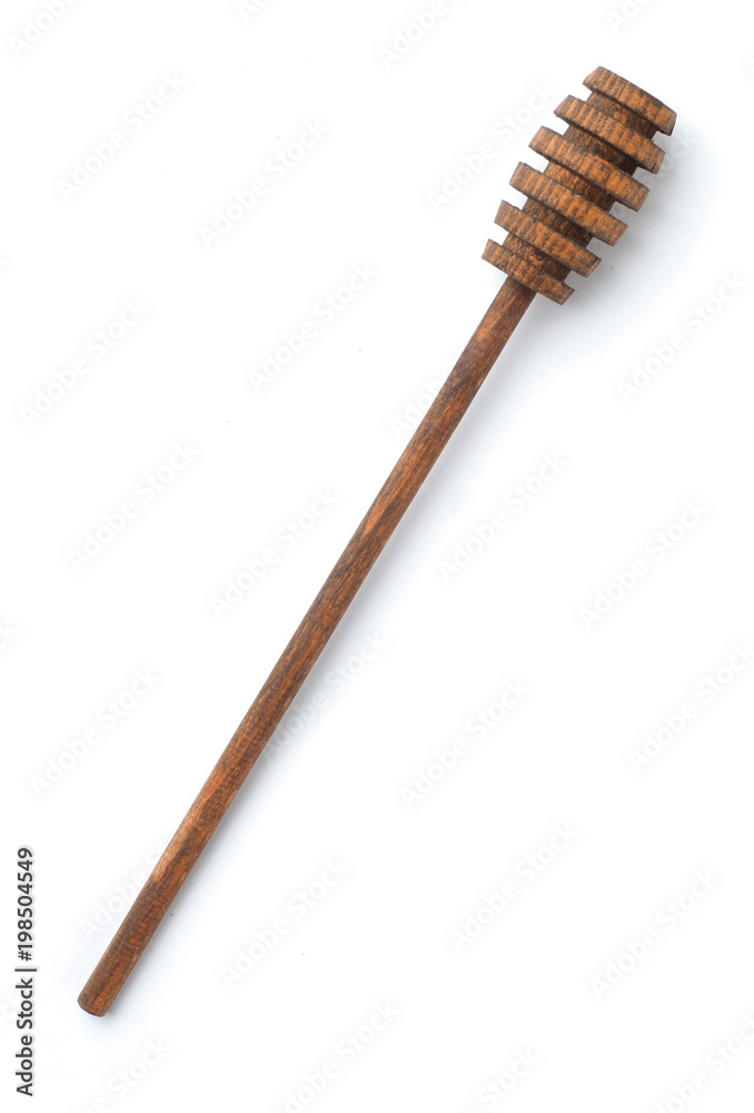 Light wooden honey wand on the white isolated background Light wooden honey wand on the white isolated background