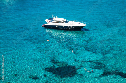 luxury yacht in turquoise Illetes Formentera mediterranean sea Balearic Islands © Lukasz Janyst