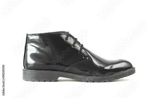 Black patent leather man boot isolated white background