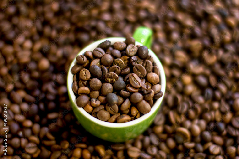 Fototapeta premium cup full of coffee beans