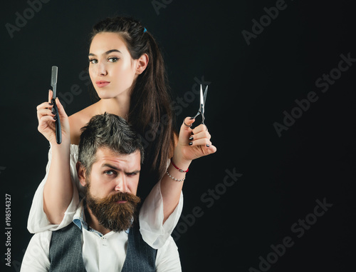 Young handsome man with long beard and woman