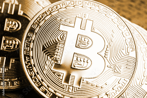 Bitcoin blockchain BTC concept. Golden Bitcoin coins as symbol of electronic virtual money