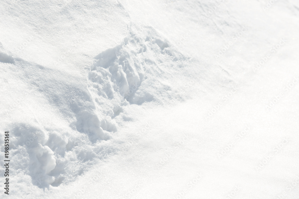 Fresh snow background texture. Winter background with snowflakes and snow mounds. Snow lumps