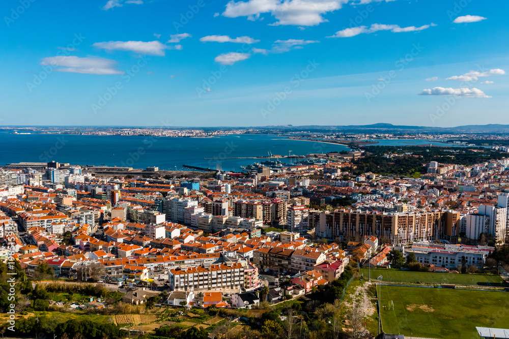 Fototapeta premium Aerial view of Almada rooftop from Christo Rei statue in Lisbon - Portugal