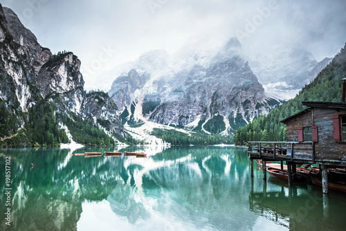 Braies lake and boats in mountain in Dolomites,Italy, Pragser Wildsee photo
