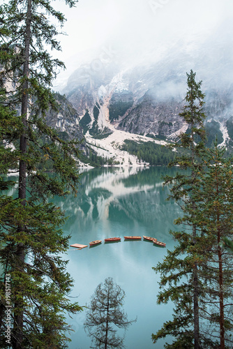 Braies lake and boats in mountain in Dolomites,Italy, Pragser Wildsee photo