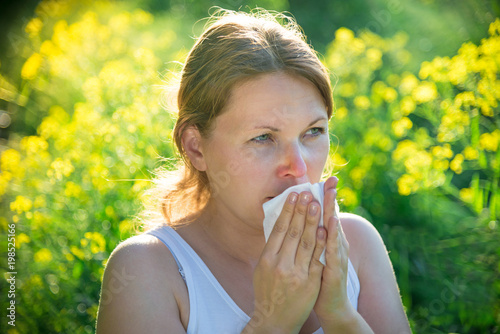 woman suffering from pollen allergy photo