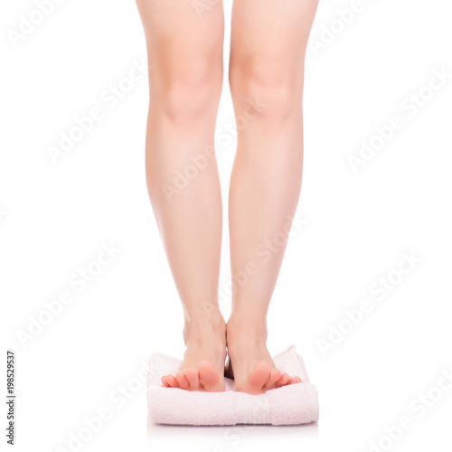 Female feet heel pink white bath towel beauty spa © Kabardins photo