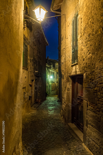 Bracciano  Italy  - The medieval historic center of the town in province of Rome famous for his castle and the lake. Here in the blue hour.