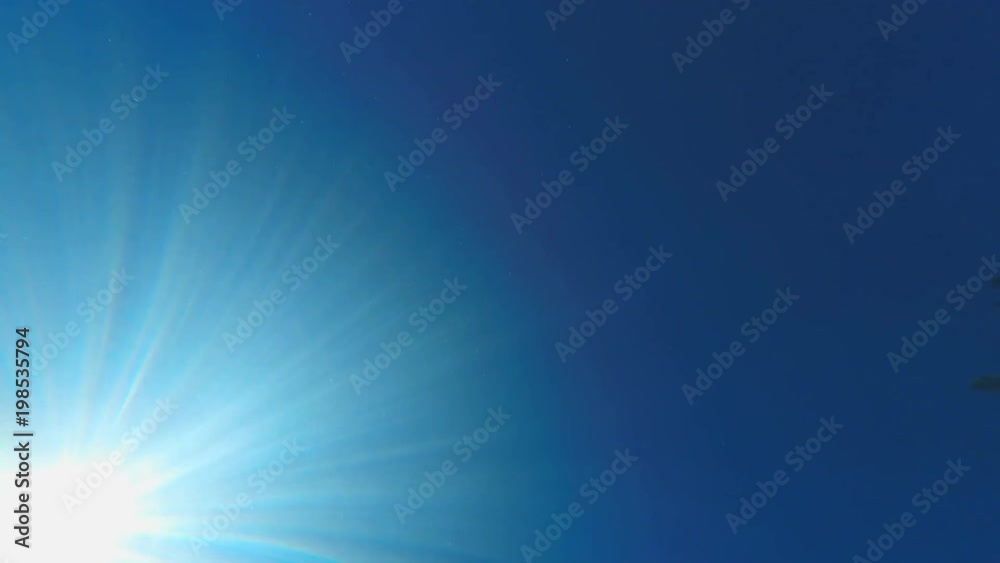 Swimming pool, sea or ocean wave underwater over blue sunny sky background. Sun and sunlight rays with copy space. Shot with GOPRO HERO4 4K UHD video. Swimming pool, sea or ocean wave underwater over blue sunny sky background. Sun and sunlight rays with copy space. Shot with GOPRO HERO4 4K UHD video.
